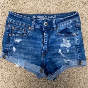 Ripped blue jean shorts
